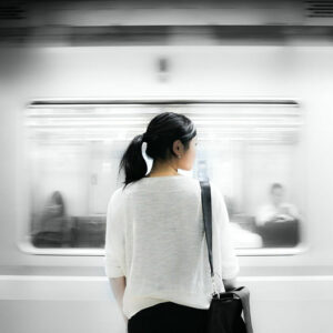 Asian woman outside of a subway