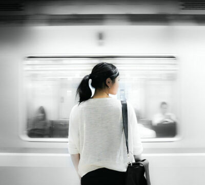 Asian woman outside of a subway